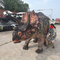 Costume de dinosaure Triceratops adulte réaliste personnalisé pour deux artistes